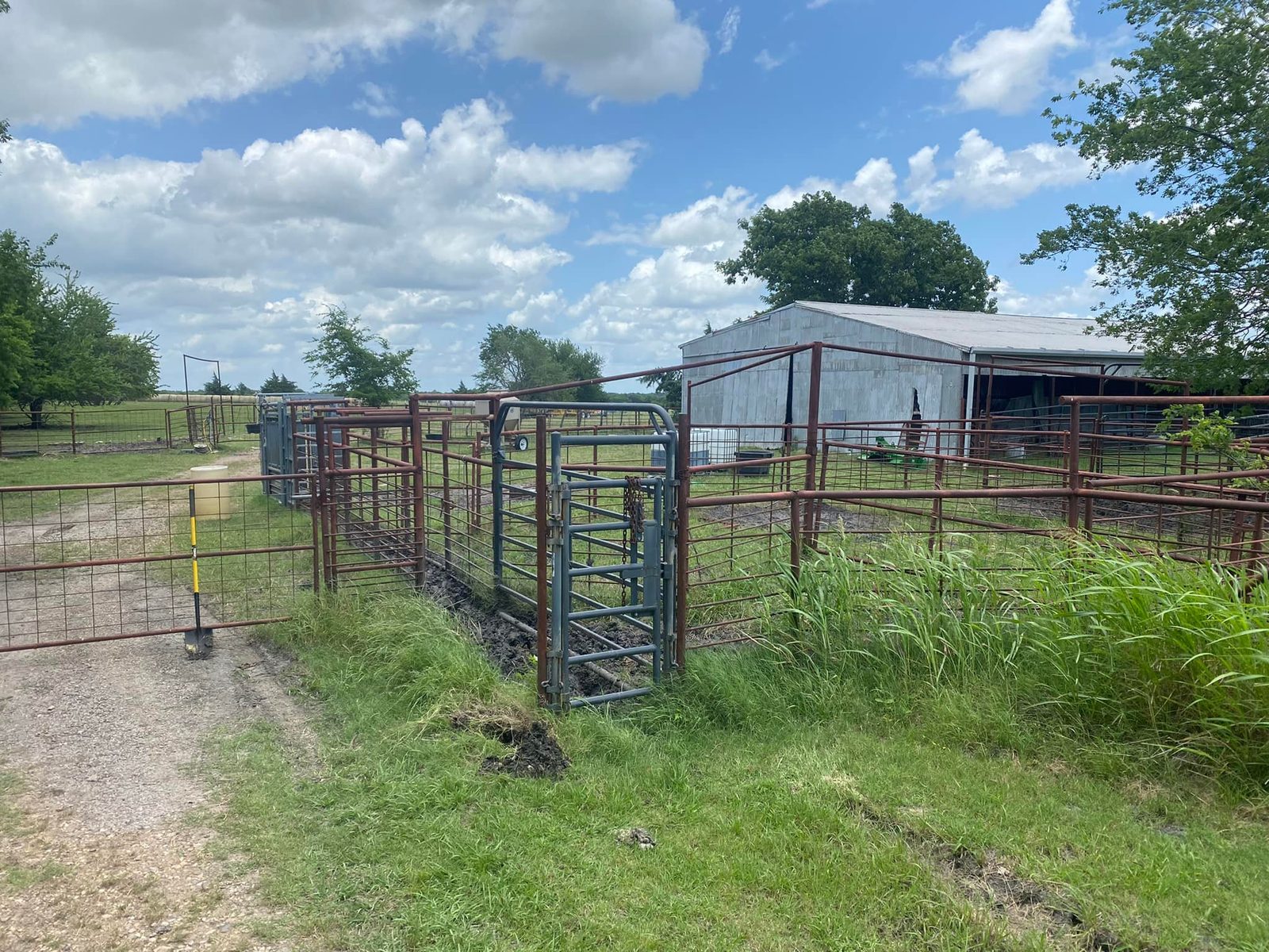 Fence and gate with metal building